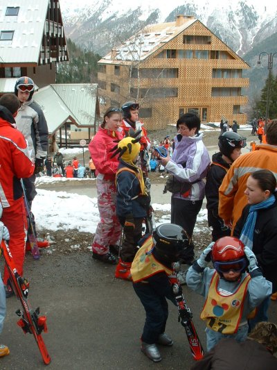 Ryan (yellow hat) prepares for his first day's skiing