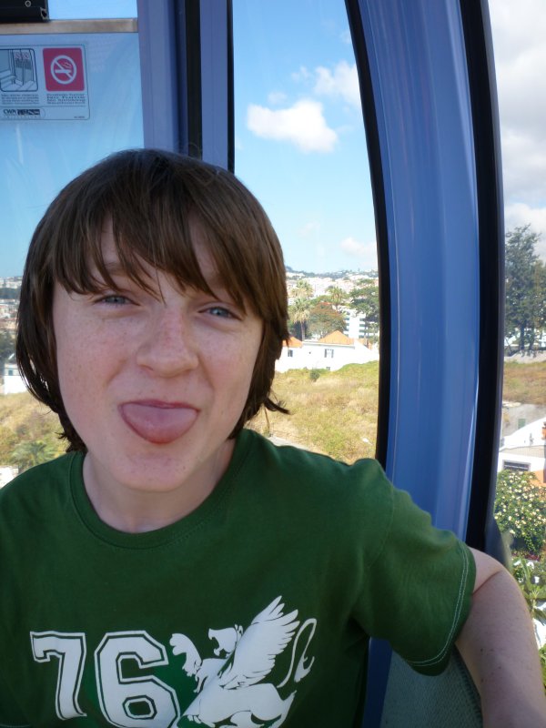 Charming teenager in a cable car